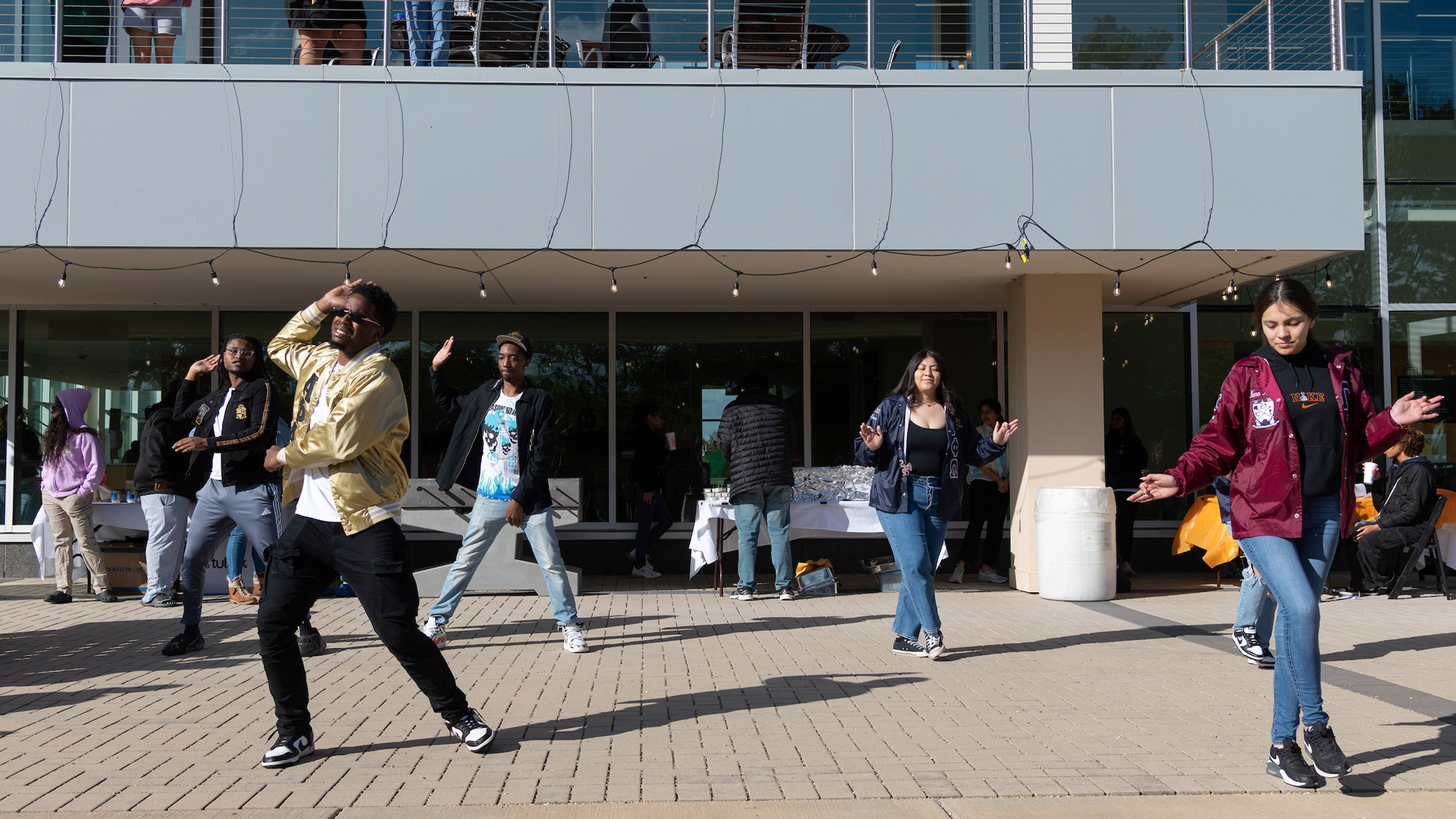 UIS students dancing outside of the Student Union