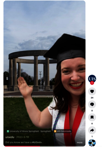 student with tik tok grad cap filter in front of colonnade