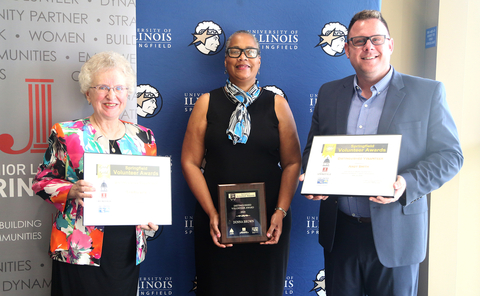 Distinguished volunteer award winners Andy Smith, Cheryl Lipe, and Donna Brown posing with their awards