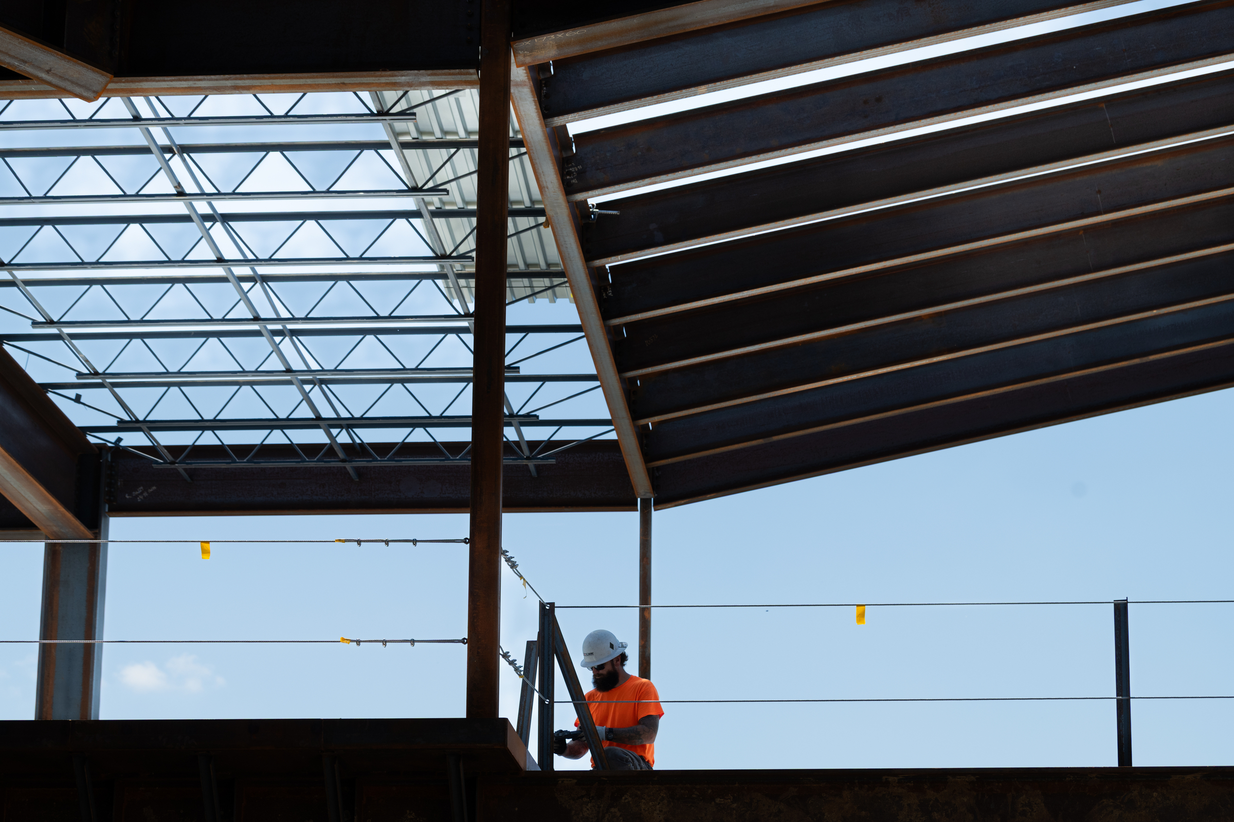 Crew member working on Library Commons