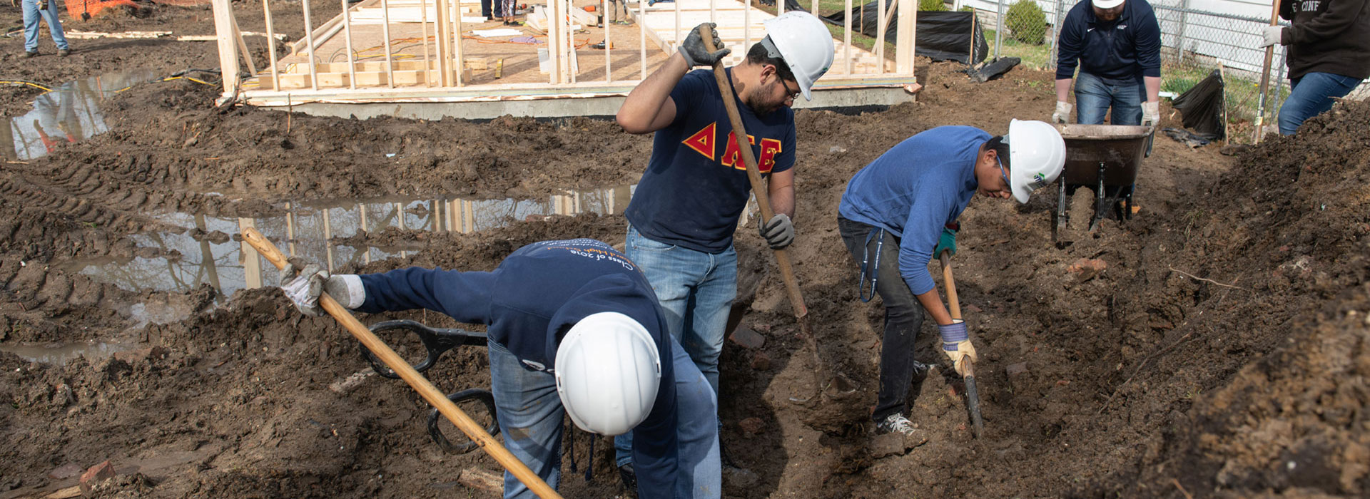 Student volunteers at a Habitat for Humanity build