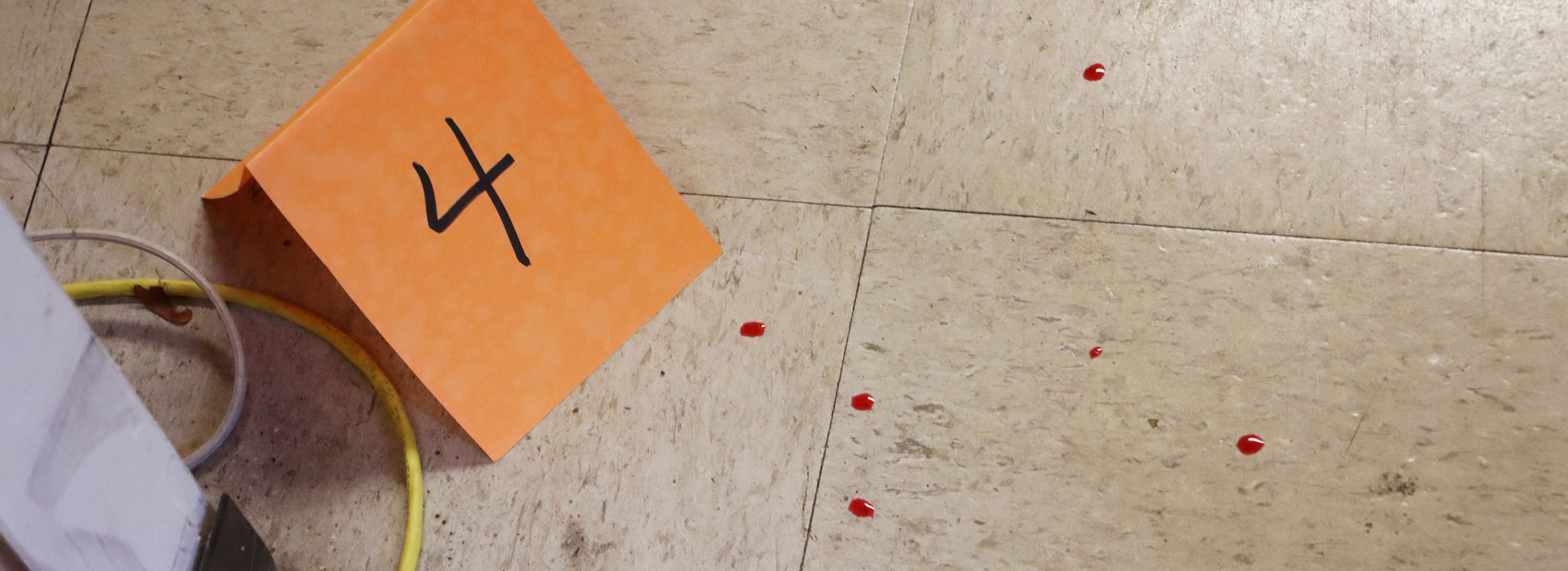blood spots next to 4 on card