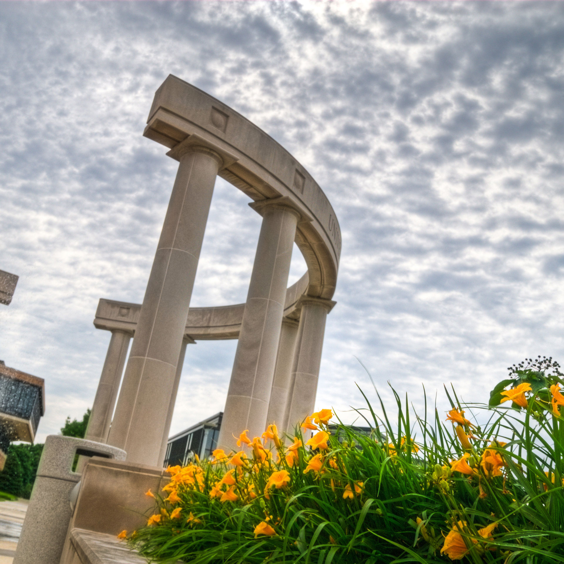colonnade in the background with flowers in the foreground