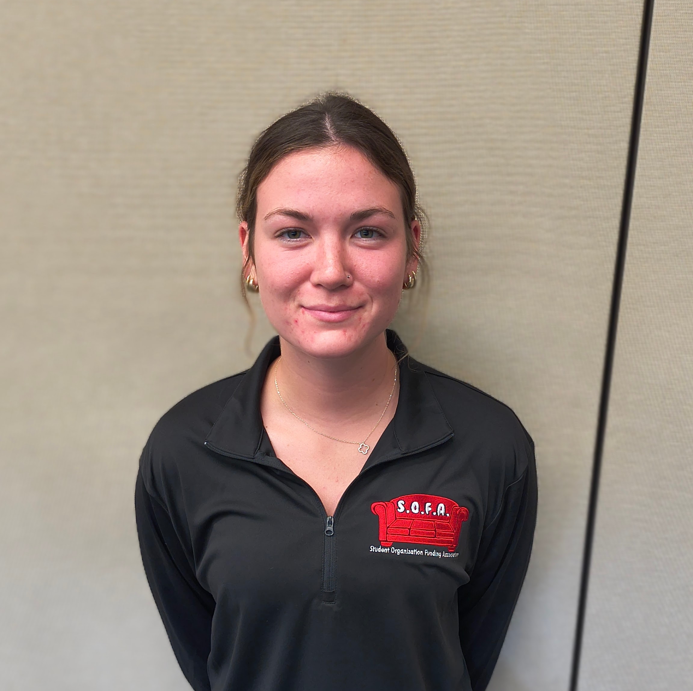SOFA Chair and SGA Treasurer, Ava Allison, smiling.
