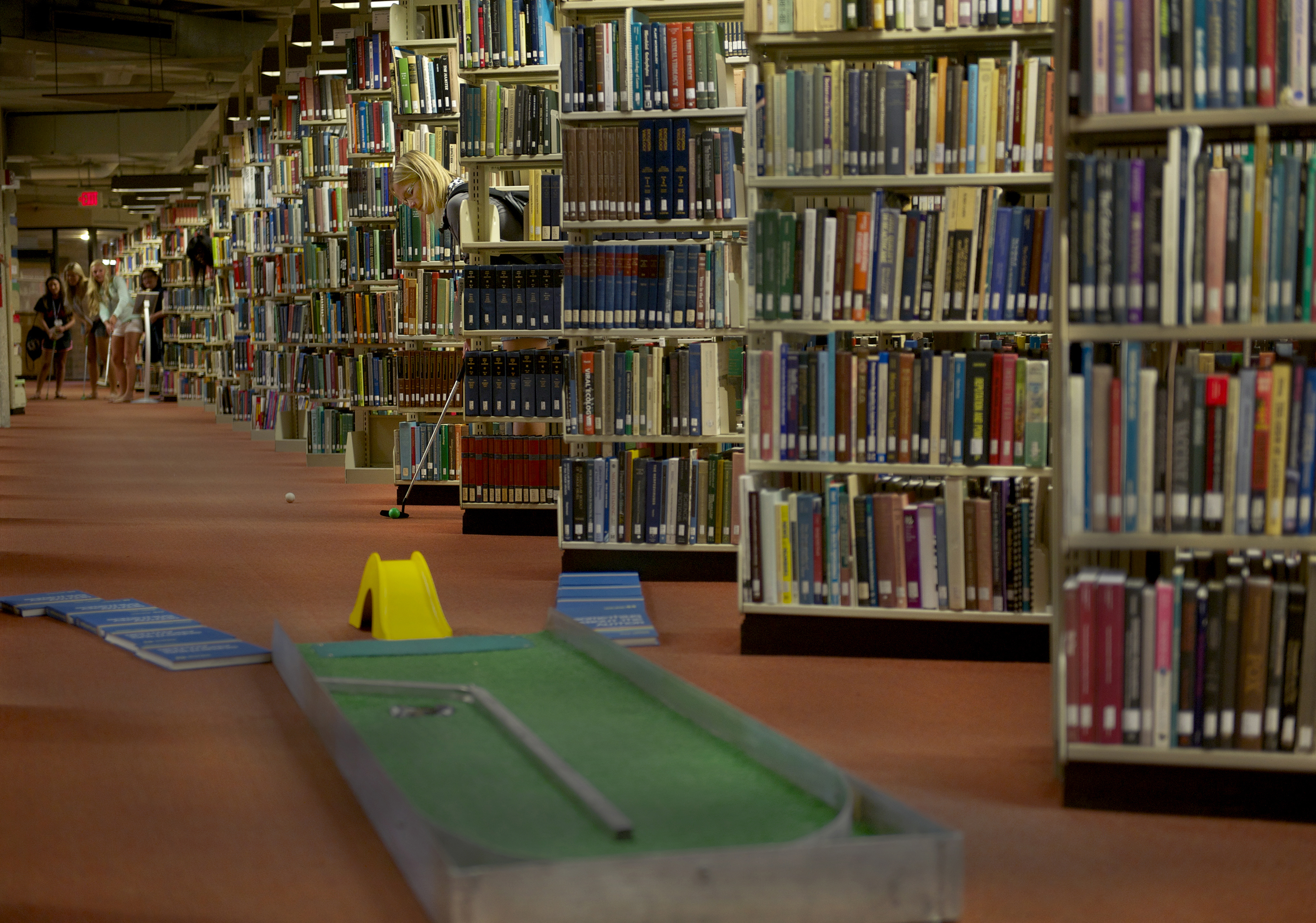 students playing mini golf in Brookens