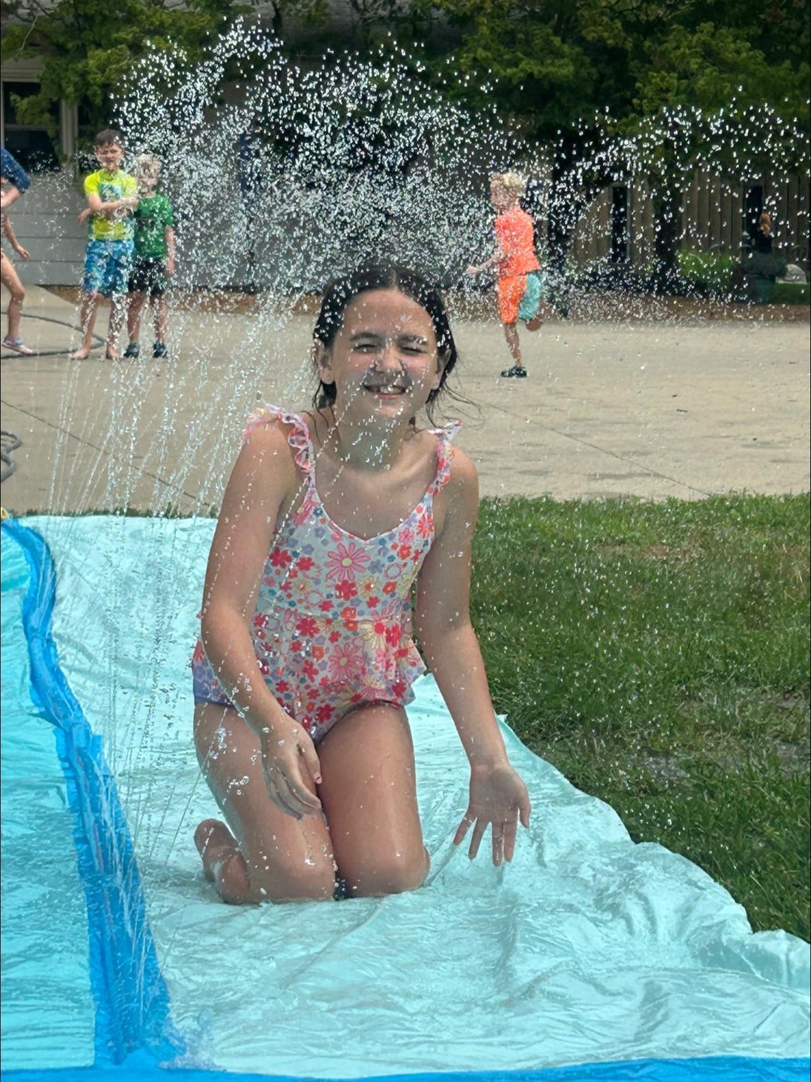 child on Slip and Slide