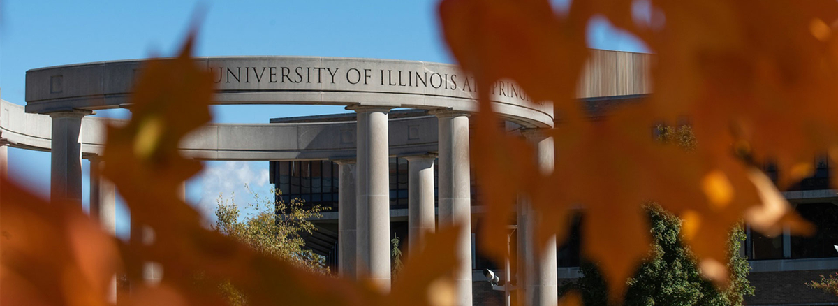 colonnade in the background with autumn foliage in the foreground