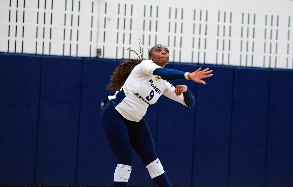 Erica Sledge serves