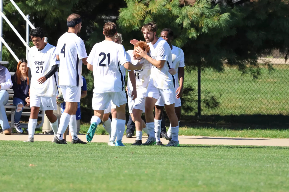 team celebrating a goal