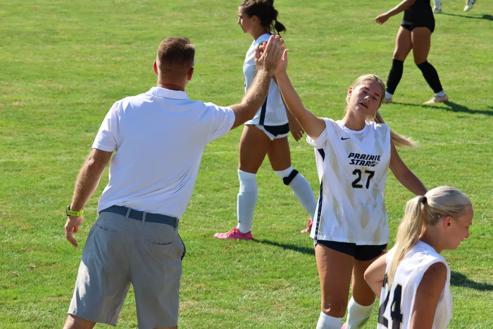 Abby Dellamorte giving Scott Myers a high-five