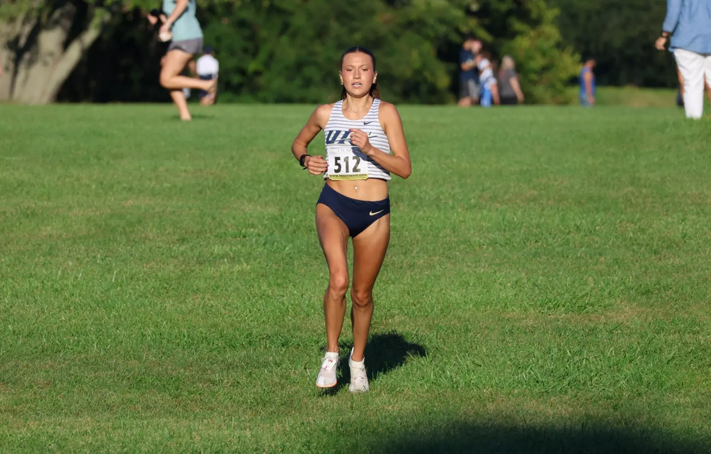 Madelyn Miller finishing cross country race