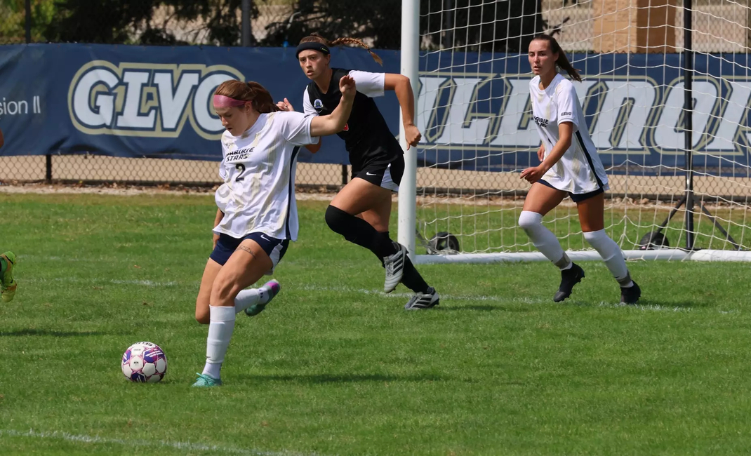 Kalli Drexler kicking soccer ball