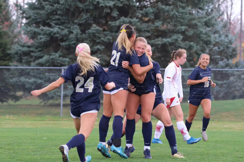 Women's Soccer celebrating a goal