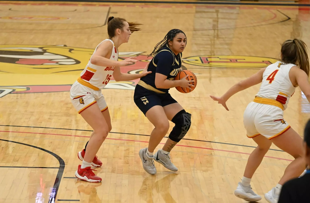 Amaya Asher playing basketball