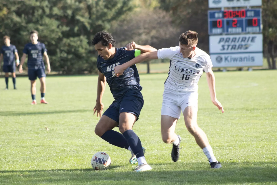 Lucas Harris battling for possession of the ball