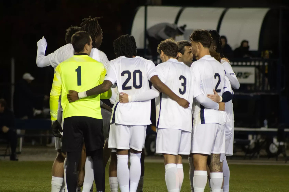 Team huddle Men's Soccer