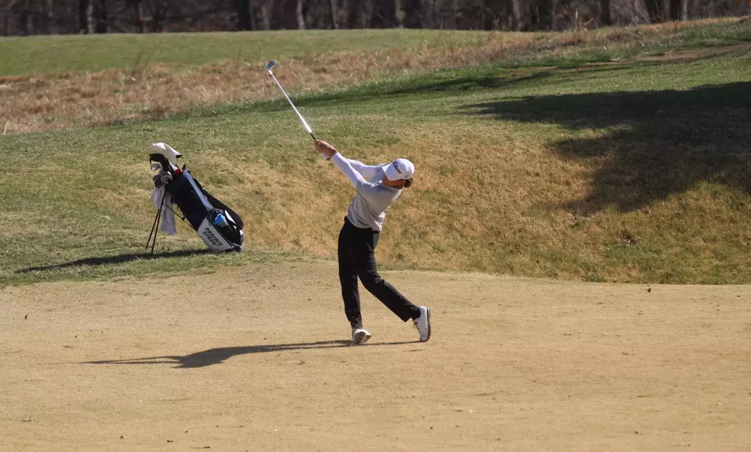 Julien Babineau using an iron