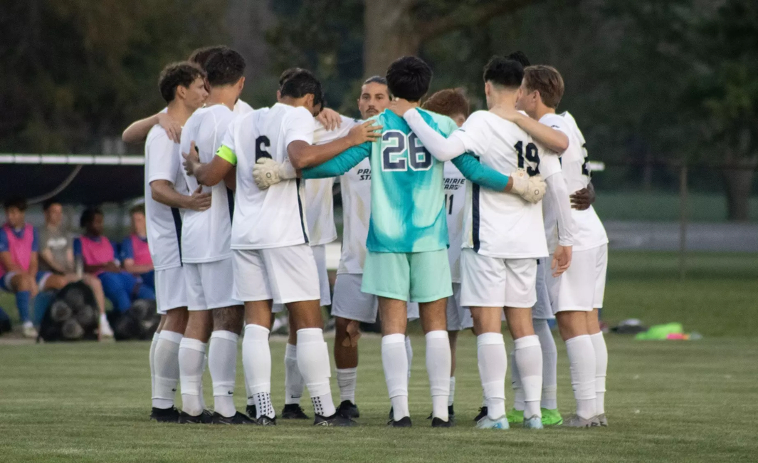 Men's soccer huddle