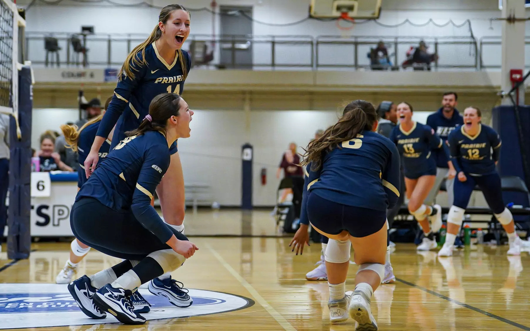 UIS volleyball team celebration