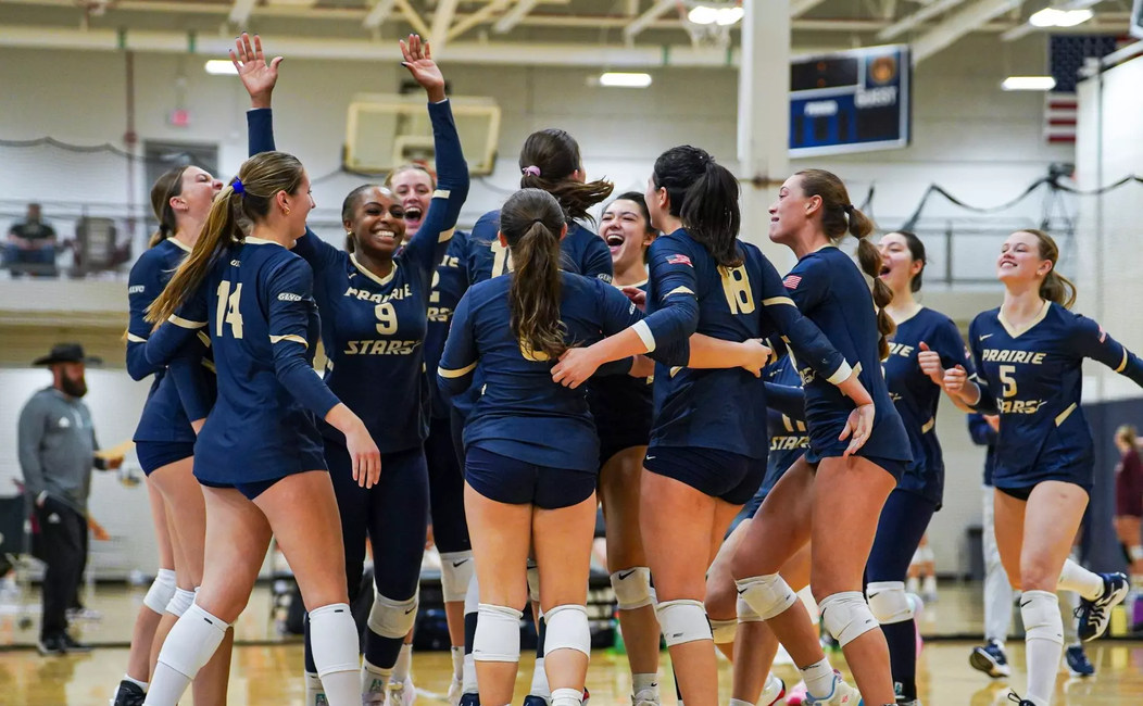 UIS volleyball team celebration