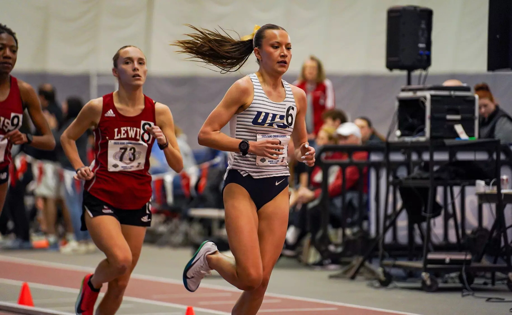 Maddie Miller racing indoor track