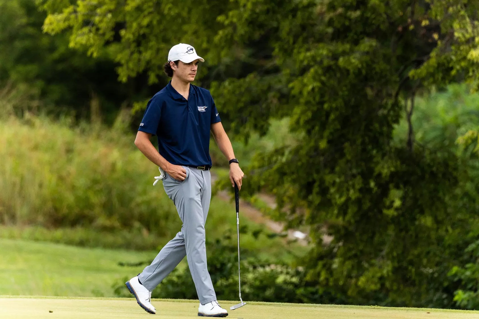 Jake Baldin walking on the green