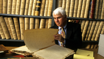 professor in front of books