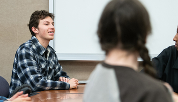 students having class discussion