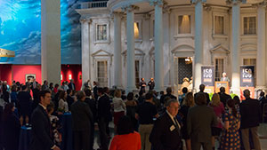 a crowd of people in dress attire at the Abraham Lincoln museum