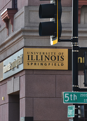 A sign on a building reads Innovate Springfield University of Illinois Springfield