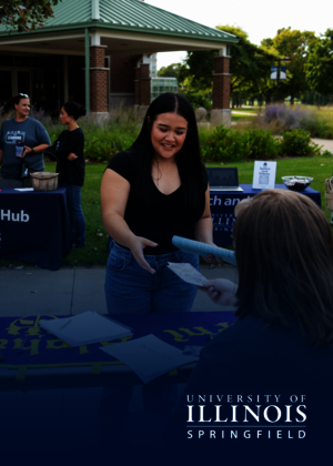 Student receiving a pamphlet