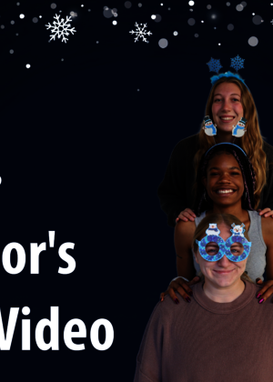 Three people stacked, wearing festive headbands, under a snowflake background.