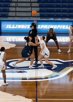 Abe Lincoln holds ball for UIS WBB tip-off photo
