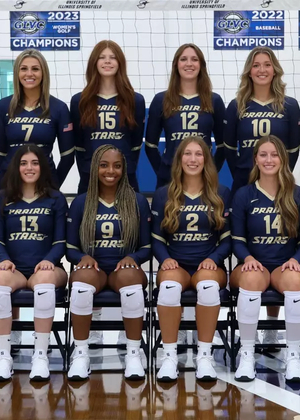 2025 UIS Volleyball Official Team Photo, athletes in navy blue uniform, also featuring Coach Ulrich