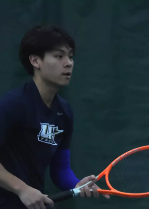 Lin En Tan playing tennis