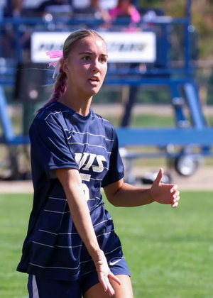 Mallory Herber playing soccer