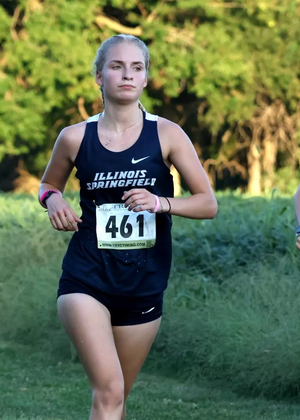 Lacey Updike and Allison Thompson running cross country