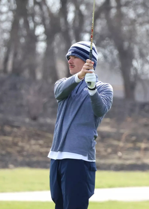 Jake Baldin golfing
