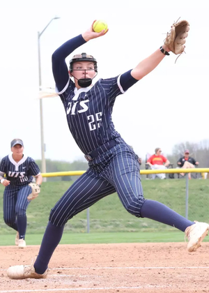 Calista Stahlhut pitching in blue UIS softball uniform