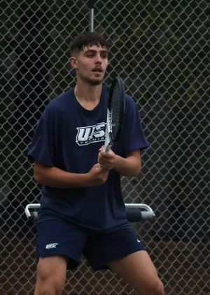 Miran Todorovic playing tennis at UIS