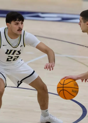 Colin Schuler playing basketball