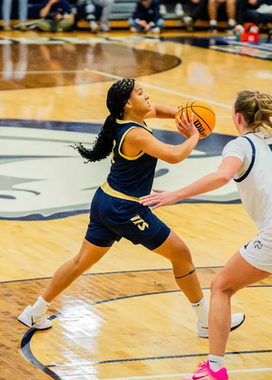 Kayla Rice playing basketball