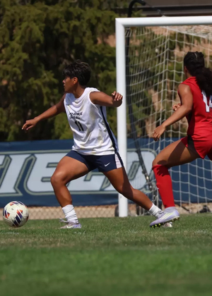 Ellie Mejia playing soccer