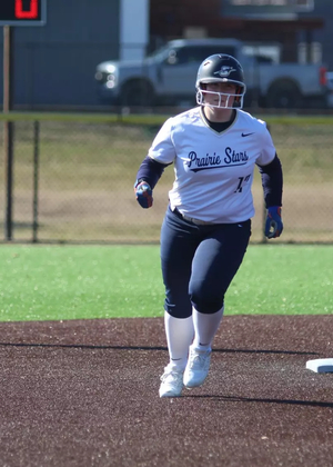 Emme Steward running the bases after hitting a home run