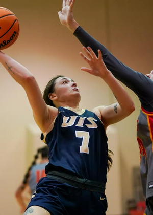 Kennedy Osterman playing basketball