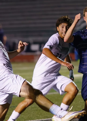 Cameron Frye playing soccer in UIS blue