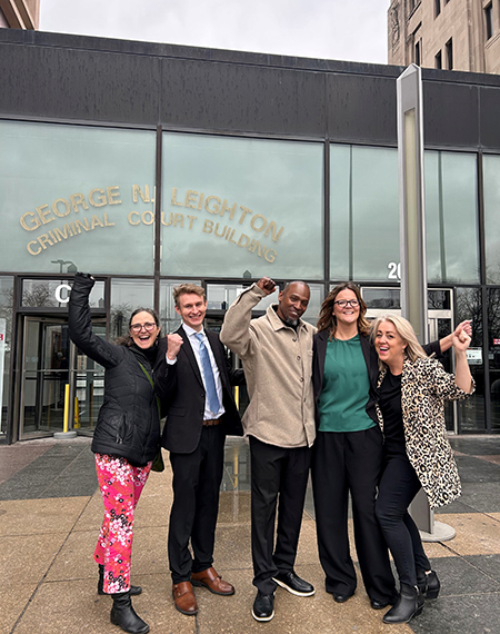 Lynn Bagley, Brandon Klages, Jerry Herrington, Leanne Beyer, and Lauren Kaeseberg celebrate Herrington’s exoneration.