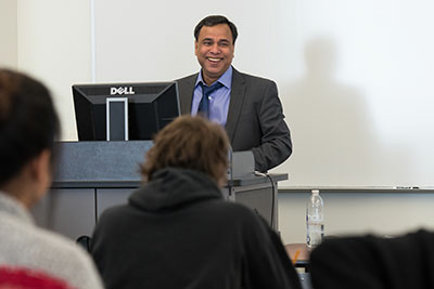 Professor addressing Economics class