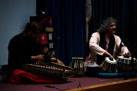 two musicians playing traditional instruments