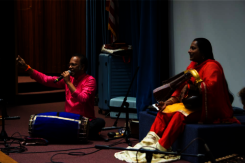 two musicians playing traditional instruments